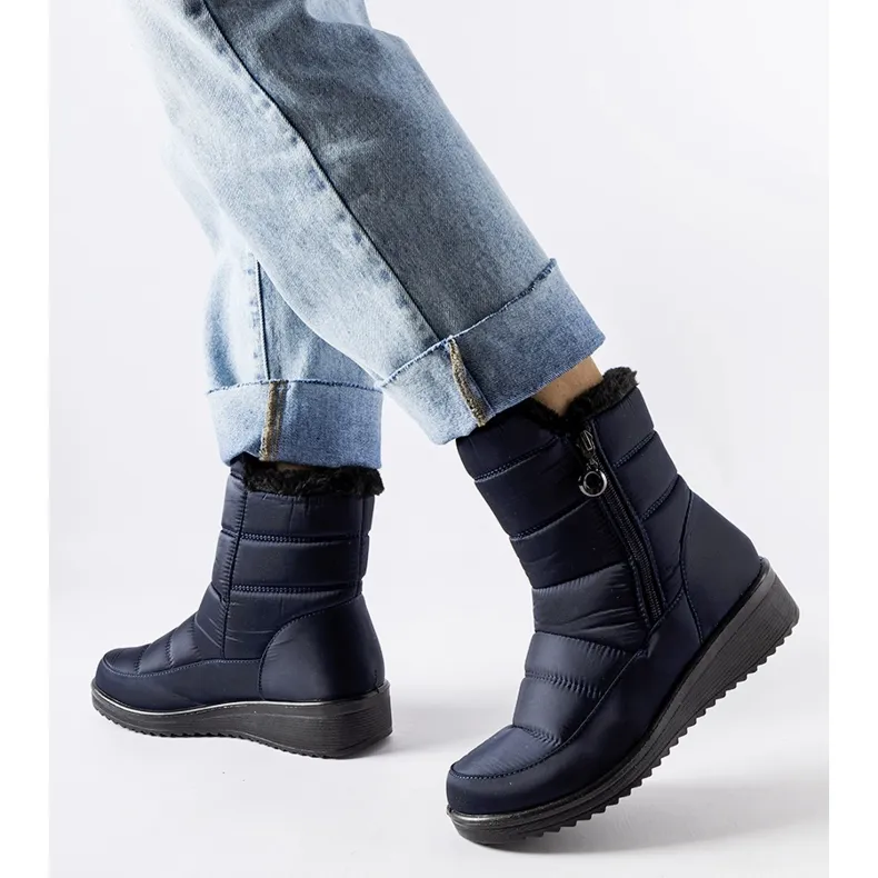 Navy blue snow boots with a low Mount wedge