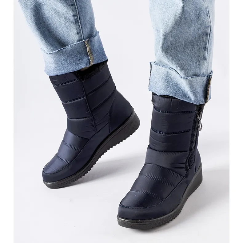 Navy blue snow boots with a low Mount wedge